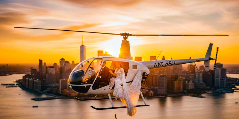 Wedding couple celebrating in a luxury helicopter over the NYC Skyline